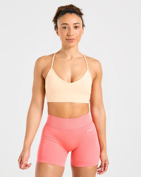 Essential V Neck Strappy Sports Bra – Pastel Peach
