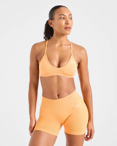 Adapt Seamless Strappy Sports Bra Bright Oranje