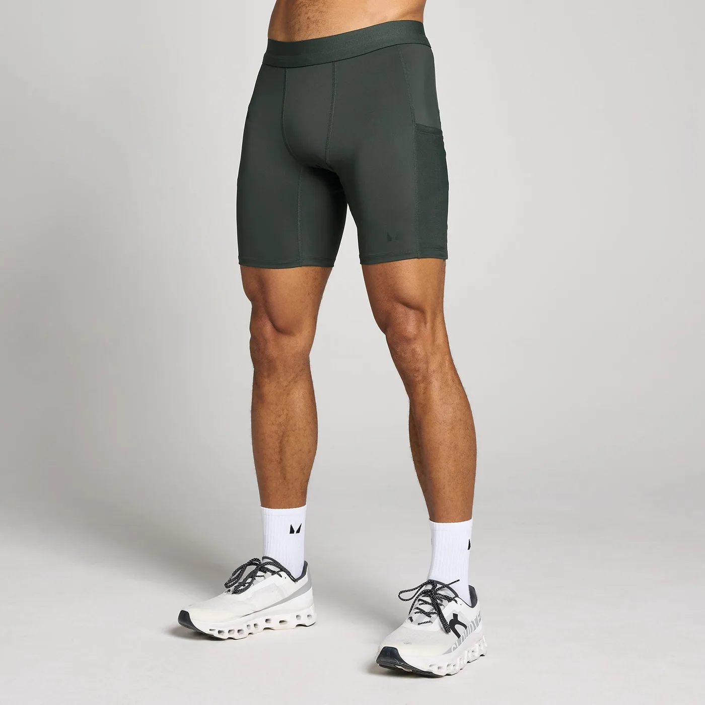 Herren Hybrid Pocket Half Tight Schwarz M